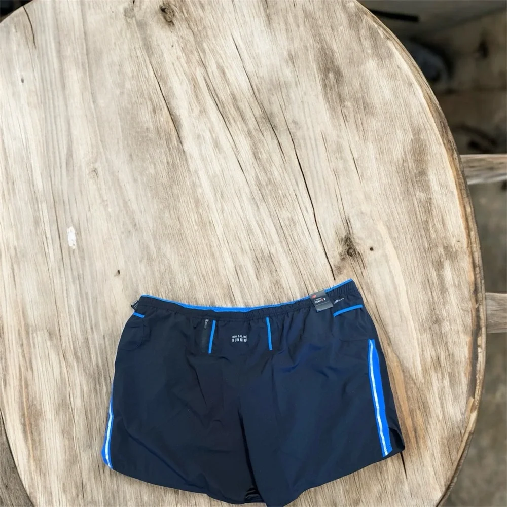 New Balance Men's Black and Blue Athletic Shorts
